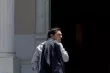 Greek Prime Minister Alexis Tsipras looks on as he arrives at this office at Maximos Mansion in Athens June 20, 2015. Greece will try to bring more to the table in negotiations for a debt deal and Tsipras will probably speak with European Commission chief Jean-Claude Juncker by phone on Saturday to try to end the deadlock, a Greek minister said. REUTERS/Alkis Konstantinidis


