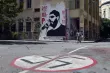 Une fresque à l’effigie de Pavlos Fyssas, tué le 18 septembre 2013, à Athènes. LOUISA GOULIAMAKI / AFP


