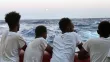Des migrants secourus en mer sur le pont du bateau Ocean Viking affrété par SOS Méditerranée et Médecins sans Frontières (MSF), le 14 août 2019 au large des côtes libyennes


