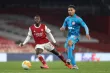 Kenny Lala (à droite) devant Nicolas Pépé, lors d'Arsenal-Olympiakos (0-1), le 18 mars 2021 en 8es de finale retour de la Ligue Europa. (Charlotte Wilson/Offside/Presse Sports)


