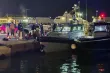 Des gardes-côtes grecs mènent des opérations de sauvetage dans un port de l'île de Chios, dans l'est de la mer Egée, en Grèce, le 3 février 2026, après une collision avec une embarcation de migrants. PANTELIS FYKARIS / POLITISCHIOS.GR / AP