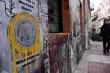 © Louisa Gouliamaki - Un graffiti du centre d'Athènes représentant un euro grec, à l'heure ou Yanis Varoufakis est en visite à Bruxelles.


