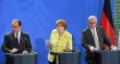 De gauche à droite, le président français, François Hollande, la chancelière allemande, Angela Merkel, et le président de la Commission européenne, Jean-Claude Juncker. - Photo Tobias Schwarz/AFP


