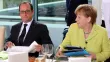 François Hollande et Angela Merkel lundi soir à Berlin. Crédits photo : WOLFGANG KUMM/AFP


