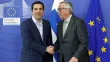 Le premier ministre grec Alexis Tsipras et le président de la commission européenne Jean-Claude Juncker. Crédits photo : FRANCOIS LENOIR/REUTERS


