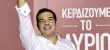 Alexis Tsipras salue ses supporteurs, dimanche, à Athènes, après le large succès de Syriza aux législatives partielles. Crédits photo : MILOS BICANSKI/Getty Images/AFP


