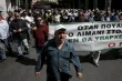 Des dockers manifestent dans les rues d'Athènes.


