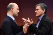 Le ministre des Finances grec Euclid Tsakalotos et Pierre Moscovici, le 5 décembre 2016. - AFP


