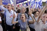 Les rassemblements se succèdent au centre d'Athènes. Ici, des partisans du oui. LOUISA GOULIAMAKI/AFP



