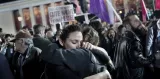La joie des supporters de Syriza, le 25 janvier à Athènes. (ANGELOS TZORTZINIS / AFP)


