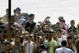 Autour du stade où ont été rassemblés des réfugiés pour les procédures d'enregistrement à la police, sur l'île de Kos, en Grèce, le 12 août.


