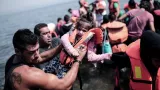 Arrivée de réfugiés arrivés en bateau, le 3 septembre 2015 sur une plage de l'île de Lesbos en Grèce.


