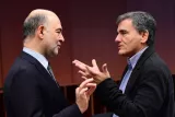 Le ministre des Finances grec Euclid Tsakalotos et Pierre Moscovici, le 5 décembre 2016. - AFP


