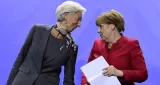 A l'issue de la rencontre sur le sujet de la dette grecque entre Christine Lagarde et Angela Merkel, mercredi à Berlin, la directrice générale du FMI s'est montrée optimiste après des semaines de blocage - AFP


