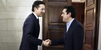 L'Europe, véritable enjeu du débat sur la Grèce Le président de l'Eurogroupe Jeroen Dijsselbloem a rencontré le Premier ministre Alexis Tsipras à Athènes le 30 janvier 2015. (POOL / PETROS GIANNAKOURIS / AFP)