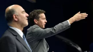 Le président de l'Eurogroupe Jeroen Dijsselbloem (D) vient de donner le coup d'envoi des négociations préalables à une troisième plan d'aide européen en faveur de la Grèce.


