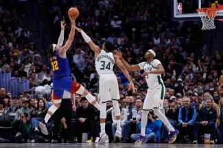 Giannis Antetokounmpo et Myles Turner sont coéquipiers chez les Bucks depuis cette saison. (Isaiah J. Downing/Presse Sports)
