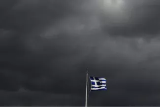 Grèce: si on le veut vraiment, on peut voir l'éclaircie? Même la météo était à la tempête, hier, à Athènes. © Reuters