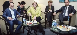 Alexis Tsipras, Angela Merkel et François Hollande jeudi 21 mai, à Riga, en Lettonie. Crédits photo : HANDOUT/REUTERS


