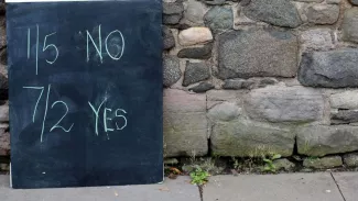 Les parieurs anglais voient affluer les mises spéculant sur la sortie ou non de la Grèce de la zone euro Crédits photo : Scott Heppell/AP


