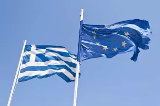 Grèce : le changement de pied à contretemps de François Hollande Pour la première fois depuis le début des négociations avec le gouvernement d'Aléxis Tsípras, en févrie, François Hollande s'est désolidarisé d'Angela Merkel en appelant à un accord avec la Grèce - Shutterstock