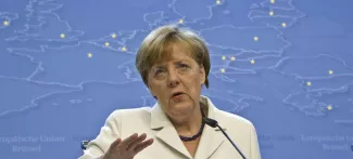 Grèce : Berlin refuse d'assumer le rôle du méchant Angela Merkel pendant une conférence de presse, lundi à Bruxelles. Crédits photo : Michel Euler/AP