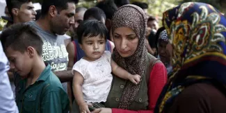 Tsipras promet d'améliorer la prise en charge des migrants en Grèce, après de vives critiques Tsipras promet d'améliorer la prise en charge des migrants en Grèce, après de vives critiques.