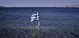 85 milliards d'euros pour la Grèce : ce que l'on sait du 3e plan d'aide Au large de l'île de Skyros en Grèce. (LOUISA GOULIAMAKI / AFP)