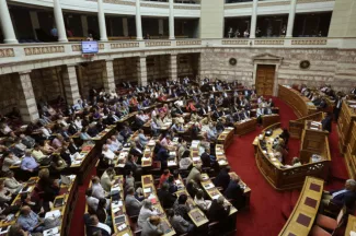 Grèce: Alexis Tsipras face à un défi politique Photo d'illustration - Selon une source anonyme, la Grèce va recevoir immédiatement une somme de 23 milliards d'euros. Image: Keystone