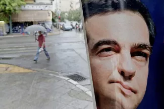 Une affiche de campagne de Syriza, lundi, dans une rue d'Athènes. Image: AP


