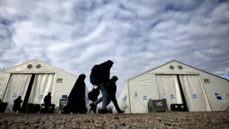 Migrants: l'UE pose un ultimatum à la Grèce Image: Keystone