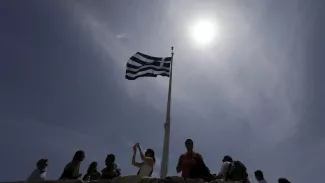 Grèce : l'Eurogroupe veut un accord dès le 24 mai Euclid Tsakalotos, ministre des Finances grec. Crédits photo : Thanassis Stavrakis/AP