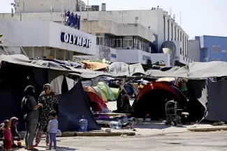 La Grèce au bon vouloir d'Erdogan et de Bruxelles Le camp d'Elliniko, installé sur le site de l'ancien aéroport d'Athènes. Image: Thanassis Stavrakis - AP