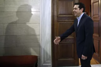 Aléxis Tsípras et l'ombre du président de l'Eurogroupe, Jeroen Dijsselbloem,à Athènes, le 30 janvier 2015.



