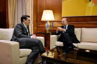 Pierre Moscovici à Athènes pour sortir de l'impasse Le Premier ministre grec, Alexis Tsípras, et Pierre Moscovici le 28 novembre à Athènes.