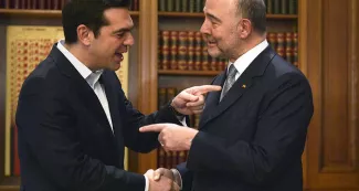 Le Premier ministre grec, Alexis Tsipras, avec Pierre Moscovici, commissaire européen. - Photo Louisa Gouiliamaki / AFP


