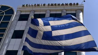 Le FMI insiste depuis plusieurs années pour que les créanciers européens allègent ce fardeau, ce à quoi s'opposait l'intransigeante Allemagne. Crédits photo : ARIS MESSINIS/AFP


