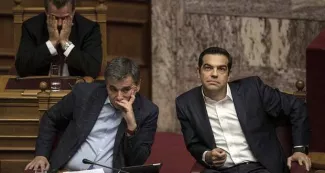 Grèce : un budget ambitieux mais risqué Le Parlement grec devait voter la loi de finances 2018 dans la nuit de mardi à mercredi. - Angelo Tzortzinis/AFP