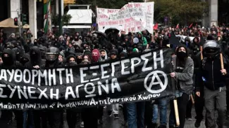 Manifestation à Athènes pour le dixième anniversaire de la mort d'un lycéen de 15 ans tué par un policier, le 6 décembre 2018


