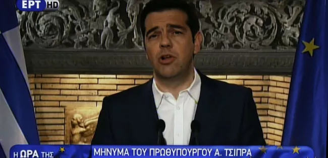 Le Premier ministre grec Alexis Tsipras lors d'une allocution télévisée, dans la nuit du 26 au 27 juin 2015 (Thanassis Stavrakis/AP/SIPA).


