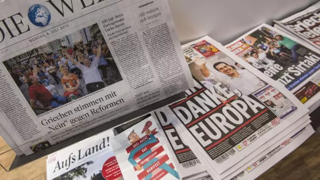 Les journaux allemands, ce lundi matin. Crédits photo : JOHN MACDOUGALL/AFP


