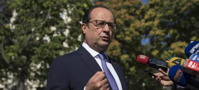 François Hollande, vendredi à Paris. Crédits photo : POOL/REUTERS


