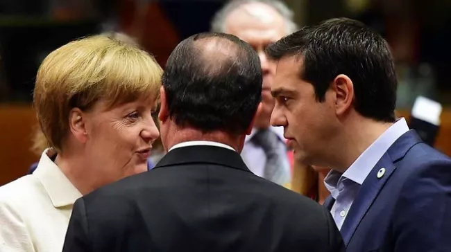La chancelière allemande Angela Merkel, le président français Francois Hollande et le Premier ministre grec Alexis Tsipras à Bruxelles le 12 juillet 2015. - AFP/John MacDougall



