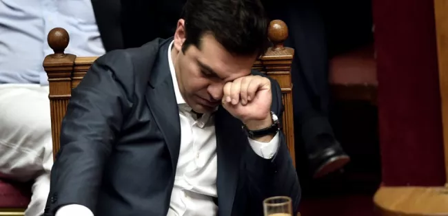 Le Premier ministre grec Alexis Tsipras au Parlement grec, le 15 juillet 2015. (ARIS MESSINIS / AFP)


