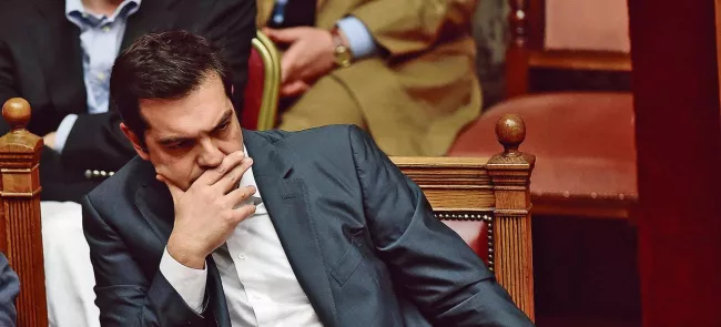 Alexis Tsipras pendant la séance de la Vouli, à Athènes, mercredi. Crédits photo : ARIS MESSINIS/AFP


