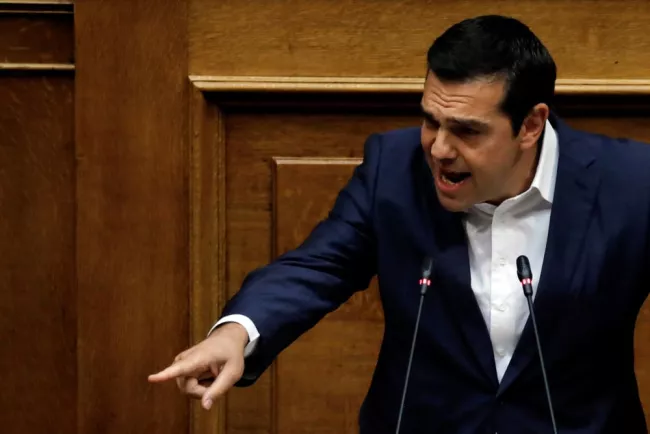Le Premier ministre grec Alexis Tsipras s'adresse aux députés lors d'une séance parlementaire consacrée à l'allègement de la dette conclu par le pays avec ses créanciers européens, à Athènes, le 5 juillet 2018.AK - REUTERS - ALKIS KONSTANTINIDIS