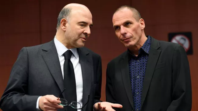 Le commissaire européen Pierre Moscovici et le ministre grec des Finances Yanis Varoufakis. Crédits photo : EMMANUEL DUNAND/AFP


