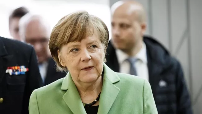 La chancelière allemande Angela Merkel. Crédits photo : Roni Rekomaa/AP


