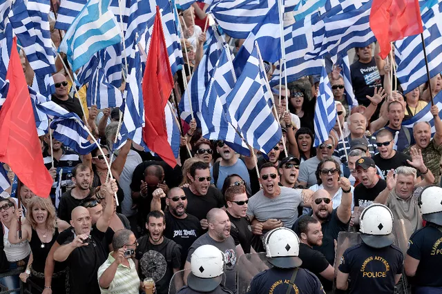 Une quarantaine des 69 accusés, membres ou sympathisants d'Aube dorée, étaient présents lundi. Image: Archives/AFP


