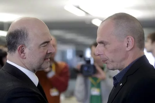Pierre Moscovici, le commissaire européen aux affaires européennes, et Yanis Varoufakis, le ministre grec des finances, lors d'une réunion de l'Eurogroupe à Riga, en Lettonie, le 24 avril 2015.


